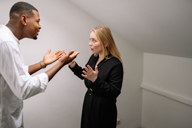 A Man and Woman Arguing Each Other in room